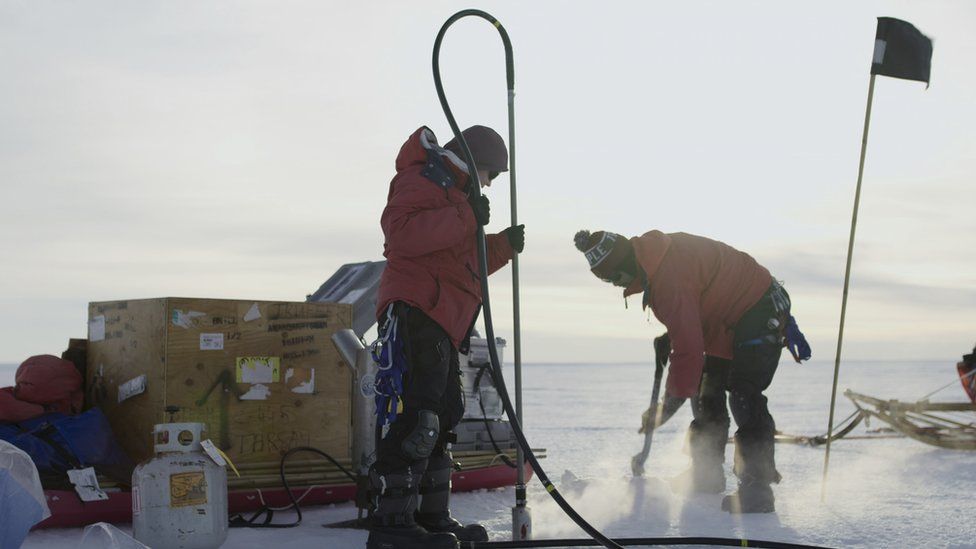 Scientists from the Thwaites Glacier Collaboration (ITGC) use a hot water drill to make a tiny hole through the ice shelf in order to sink a probe which will monitor the water beneath.